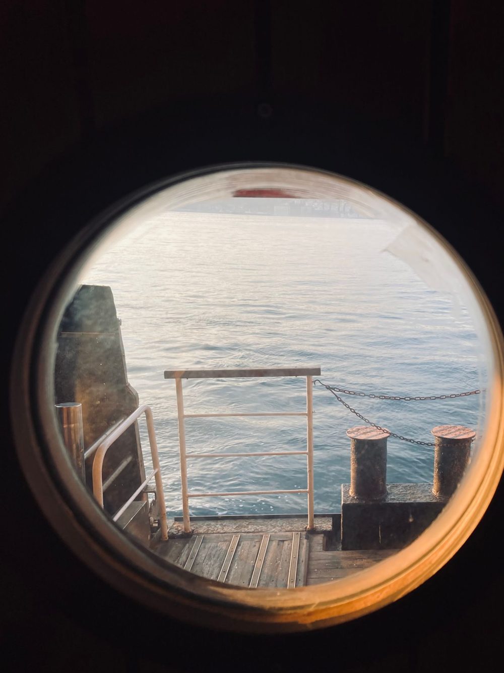 View of the sea through a porthole